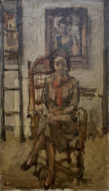A woman is sitting.
